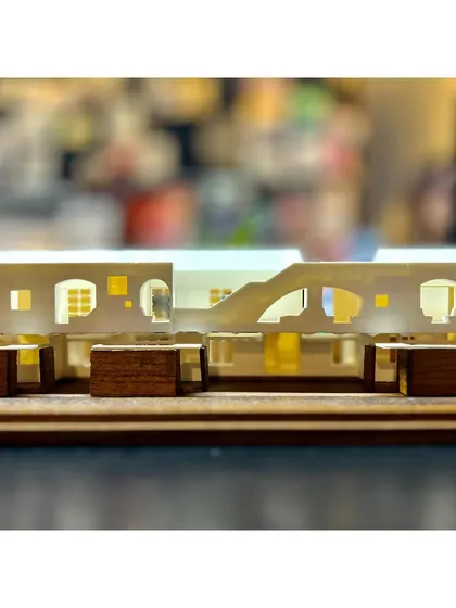 A studio vignette showing a detailed sectional model for a housing project. We combine materials like 3D printed PLA and wood to study the relationship between different building components.