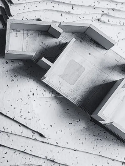 My process is rooted in craft. This physical study model shows the ground floor of a house designed for the hills, with the building's form embedded directly into the site's natural contours, demonstrating a harmonious integration of structure and landscape.