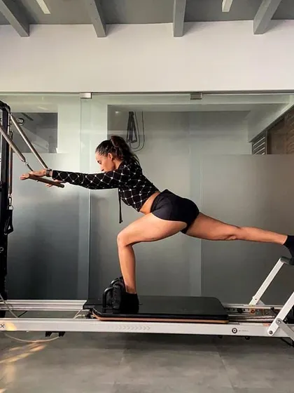 This lunge variation on the Reformer targets the glutes and legs while challenging your balance and core engagement. We focus on precise form to ensure you get the most out of every single movement.