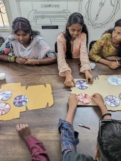Students from our NGO partner visit working on a chromatography experiment. It's a simple and beautiful way to learn about the separation of colors.