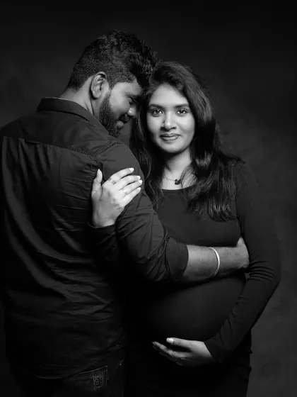 An intimate and loving black and white portrait of the couple, their expressions full of tenderness.