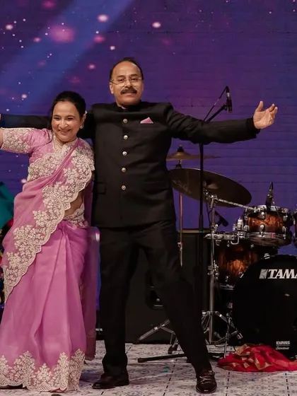 The parents of the groom showing off their moves and their beautiful chemistry on stage.