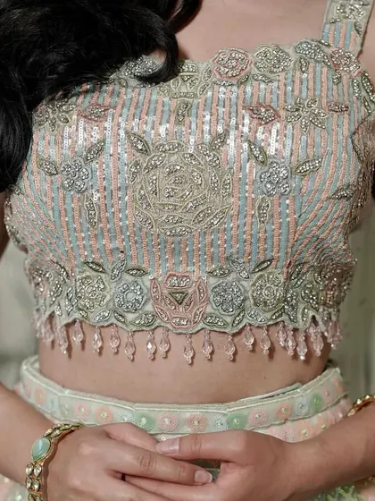 Another detailed shot of the beautiful blouse, highlighting the craftsmanship of my rental collection.