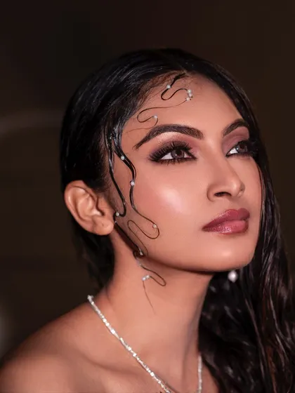A different angle from our wet-look series, focusing on the artistic placement of the pearl-adorned hair strands. The upward gaze and soft lighting add a dreamy, ethereal quality to the image.