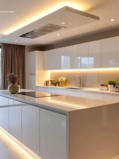 This all-white kitchen is the epitome of clean and modern design. The large island with an integrated cooktop provides a central hub for cooking and socializing. Glossy, handleless cabinets enhance the minimalist aesthetic.