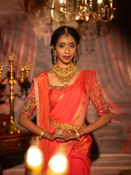 A direct, confident pose showing the full effect of the student's work. The makeup enhances the model's natural beauty, perfect for her special day.