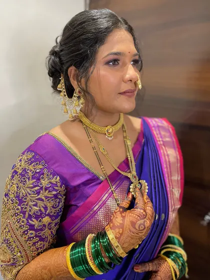 This bride chose a stunning violet Nauvari instead of the traditional yellow, and she looks absolutely incredible. I love helping brides find unique ways to express their style.