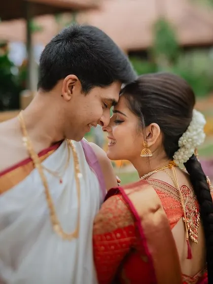 An intimate close-up capturing the pure emotion between the couple. We focus on these small, meaningful interactions that tell a powerful story of love.