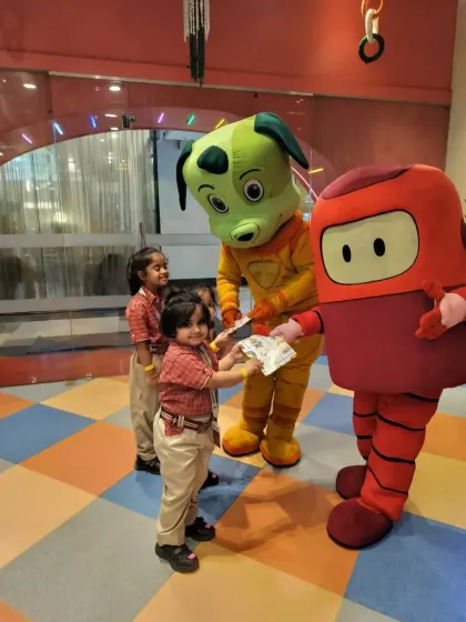 We love hosting school trips. Here, students from Somerville International School meet our mascots, Tinga Dojo and Boxy, during their fun-filled visit.