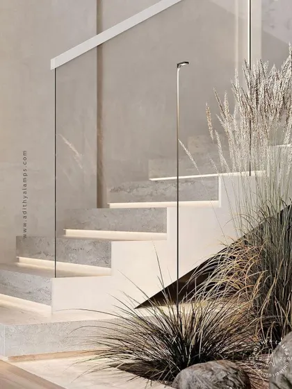 A duplicate of image 83, this image emphasizes the sleek and functional design of integrated stair lighting, which adds both safety and high-end style.
