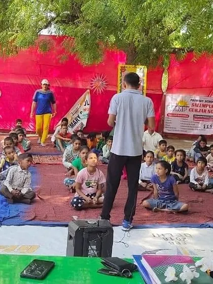 Instructing children on the basics of martial arts during an outdoor summer camp. We teach them discipline and focus from the very beginning.