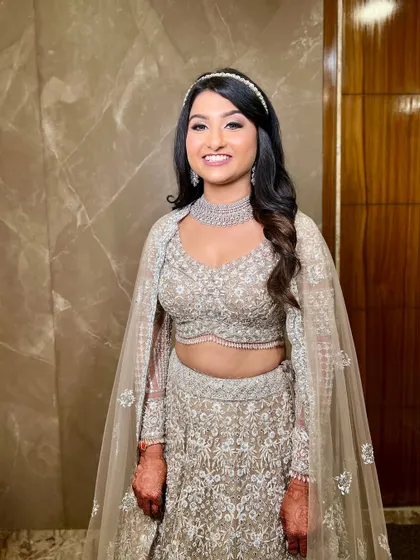 A close-up portrait of the bride, her smile radiating happiness.