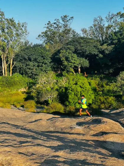 An action shot of me running on the rocky terrain of Nandi Hills. This is what trail running is all about.