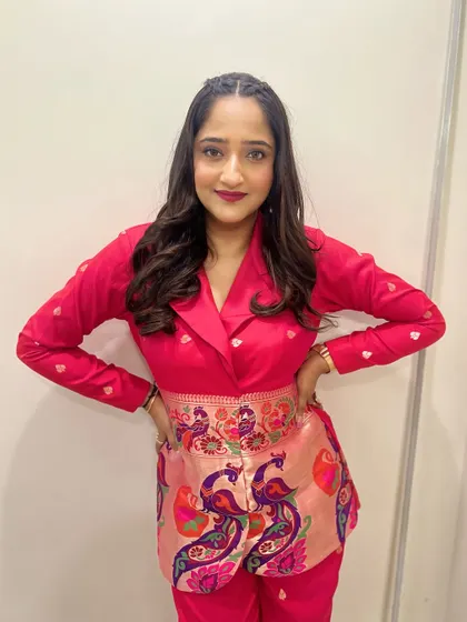 Actress and lyricist Aditi Vinayak Dravid looking sharp and stylish for the 'Gulabi' premiere. I gave her a fresh, youthful look with a pop of color on the lips to match her vibrant pink outfit.