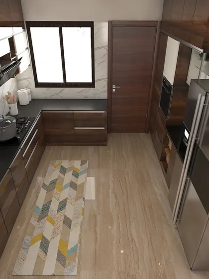 An overhead view of the L-shaped kitchen layout, demonstrating efficient use of space with ample counter area and well-organized cabinetry.