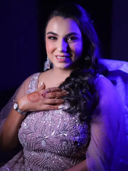 A pretty party look for an evening event. The soft glam makeup with a focus on the eyes complements her lavender gown perfectly.