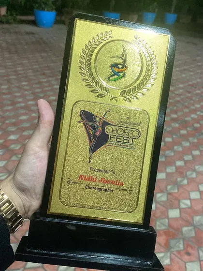 A close-up of the Choreofeast award. It's a milestone that fuels my passion to keep creating and inspiring.