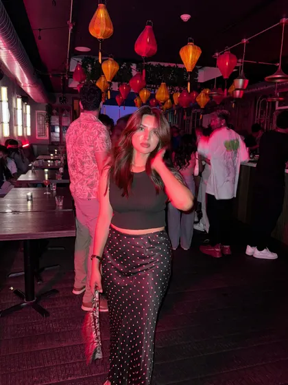 Another shot from a fun night out, showing my polka dot skirt and crop top.