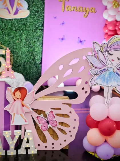 A detail shot of the fairy and butterfly props from Tanmaya and Tanay's twin party.