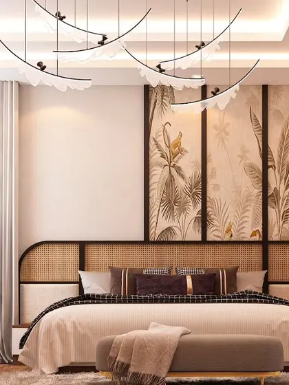 This bedroom design brings the outdoors in with a subtle, sepia-toned botanical wallpaper. The look is completed with a modern rattan and wood headboard and a unique, wave-like ceiling light fixture.