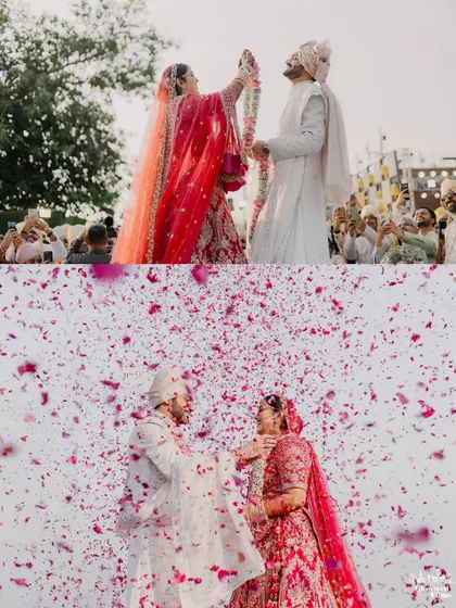 The playful and joyous varmala exchange between Aditi and Jimit, followed by a shower of pink petals, celebrating their union.