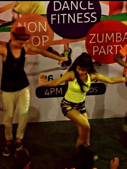 A duplicate of 36, showing the dynamic movement and fun of a live Zumba performance.
