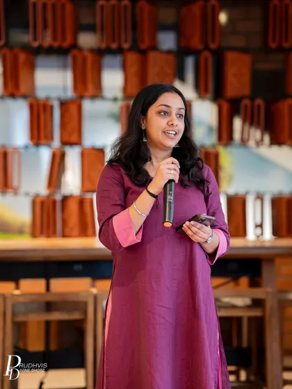 A poet shares her work with grace and confidence at a Sunday open mic. Our platform is dedicated to giving voice to stories that need to be told.