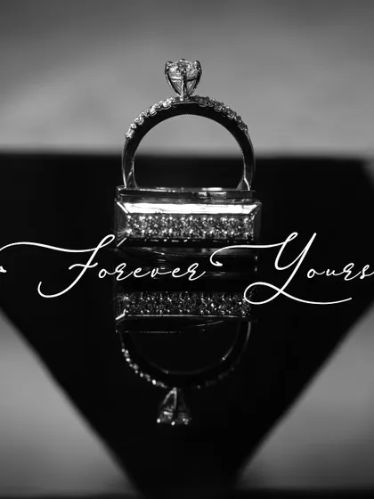 The rings are a symbol of your promise, and they deserve a special portrait of their own. This artistic, black and white shot focuses on the beauty of the rings, reflecting them to create a sense of infinity.