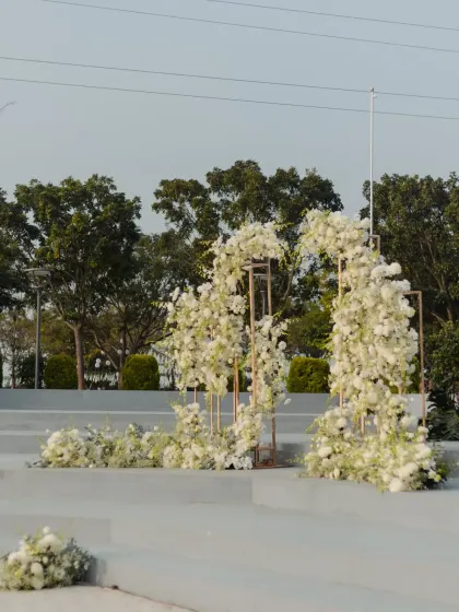 A modern and artistic floral installation, creating a beautiful and unconventional ceremony backdrop.