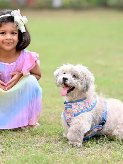 A girl and her best friend. I love including pets in family photoshoots to capture the complete family unit in a natural, outdoor setting.