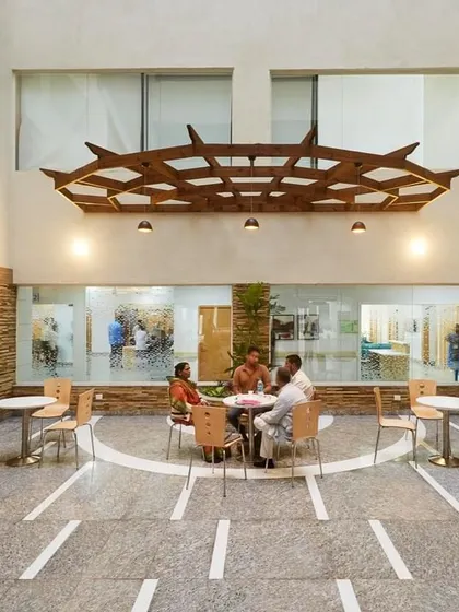 Evidence-based design highlights the importance of biophilia and natural light. This outdoor courtyard at Ramkrishna Care Hospital provides a picturesque view and a soothing natural environment for patients and caregivers.