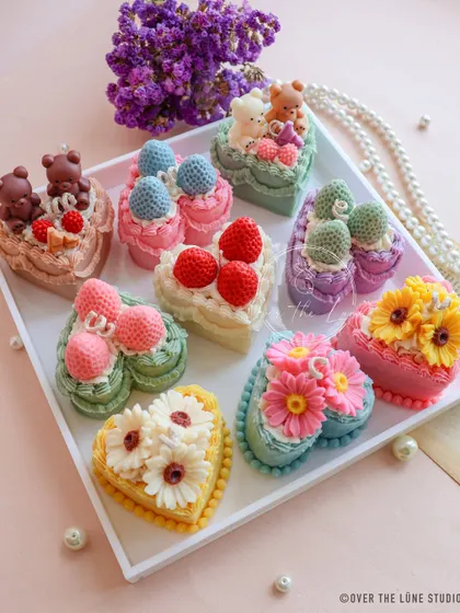 Nothing says 'happy birthday' like a cake you can keep forever. My collection of heart-shaped cake candles, complete with tiny strawberries, flowers, and teddy bears, are the perfect unique gift for your bestie's special day or a baby shower.