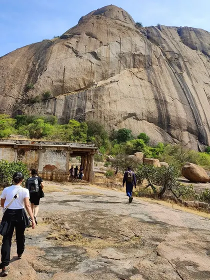 Making our way towards an old temple structure at the base of the main climb. Our treks often include exploring interesting historical sites along the way.