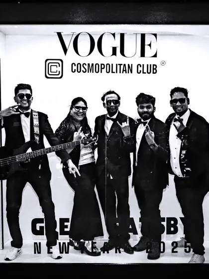 The band having fun at a New Year's photo booth. We bring not just music, but also a spirit of fun and celebration to every event.