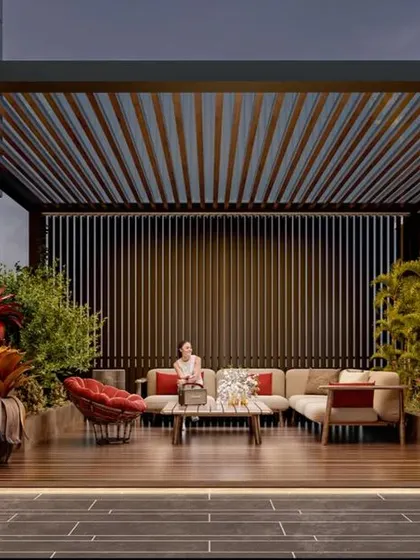 A spacious terrace with a modern pergola. This design creates a shaded outdoor living room, perfect for hosting friends or enjoying a quiet evening.