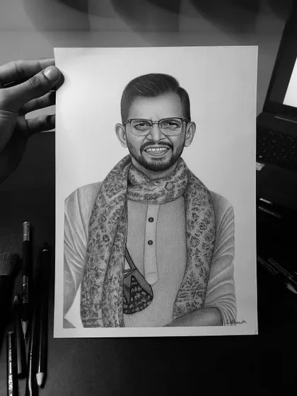 A handheld view of the finished A4 pencil sketch for my Mumbai client. Holding the final piece is always a satisfying moment.