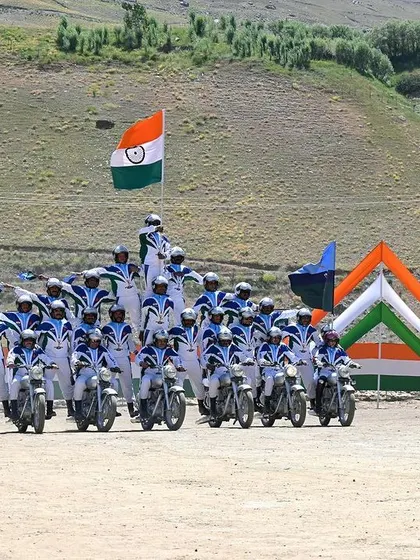 An impressive motorcycle formation by the Indian Army's stunt team. This kind of shot showcases the discipline and skill on display at the event.