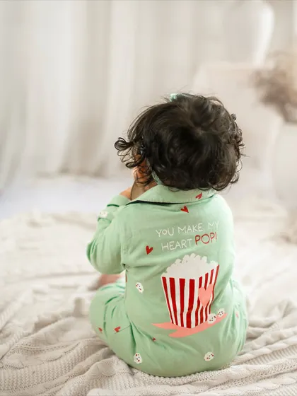 "You make my heart pop!" The back of this little one's pajamas says it all. The details in the outfits add so much personality to a shoot.