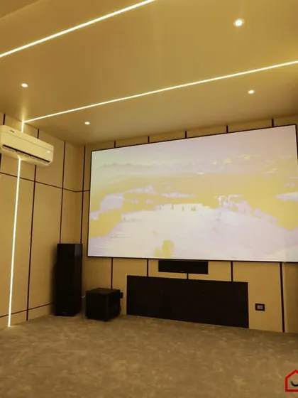 A duplicate of 366, this shot showcases the clean front of the room, with the large screen and powerful speakers.