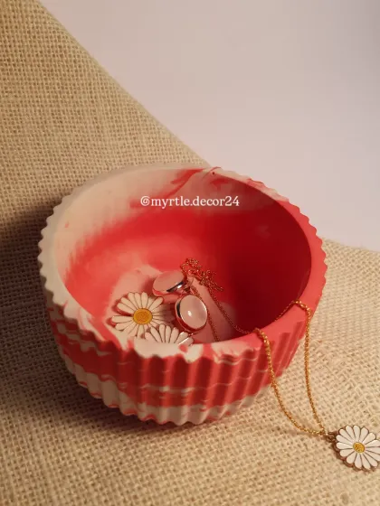 Another perspective of our red and white marble round jar, showing how the light catches the patterns.