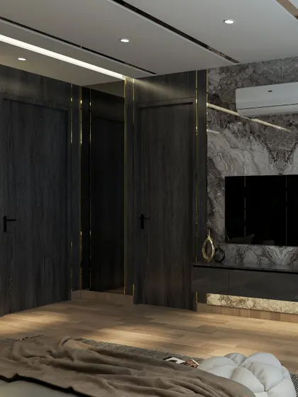 In this luxurious bedroom, I used deep wood tones, a dramatic marble accent wall, and sleek matte finishes. The gold inlay and layered lighting add warmth and rhythm, creating a refined and comfortable atmosphere.
