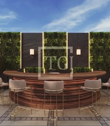 A render of a stylish rooftop bar setup for a project in Mumbai. The design features a curved wooden bar, elegant high-top chairs, and a vertical garden backdrop, perfect for creating a chic and inviting commercial venue.