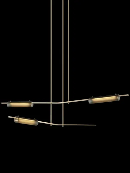 A studio shot of the linear Volant configuration against a black background, ideal for illuminating dining areas or kitchen islands.