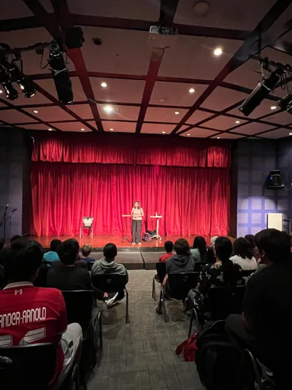 A wide shot of the auditorium at Lincoln School. It was a full house and a very energetic crowd.