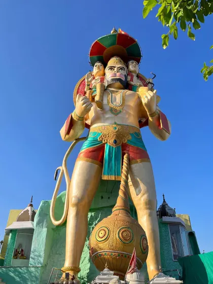 The towering statue of Lord Hanuman near Pali, Rajasthan, carrying Rama and Lakshmana on his shoulders.