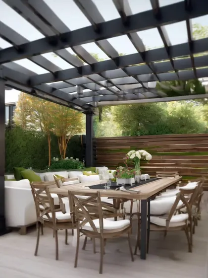 This design concept shows a spacious outdoor dining and lounge area under a large, dark-framed pergola. It illustrates how we can create a perfect setting for entertaining, complete with comfortable seating and lush surrounding greenery.
