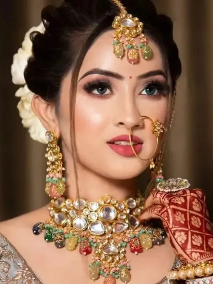 A unique Navratan-style Polki necklace with multi-colored stones. This is a vibrant and colorful option for a mehendi or sangeet ceremony.