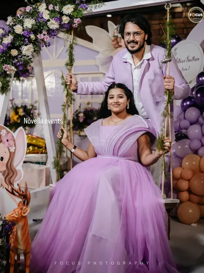 A royal portrait of the family at a lavender-themed fairy party. The floral swing is one of our signature pieces for creating stunning photo opportunities.