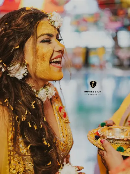 The vibrant color and infectious laughter of a Haldi ceremony. I love capturing the energy of these traditions, focusing on the genuine smiles and blessings that make these rituals so special.