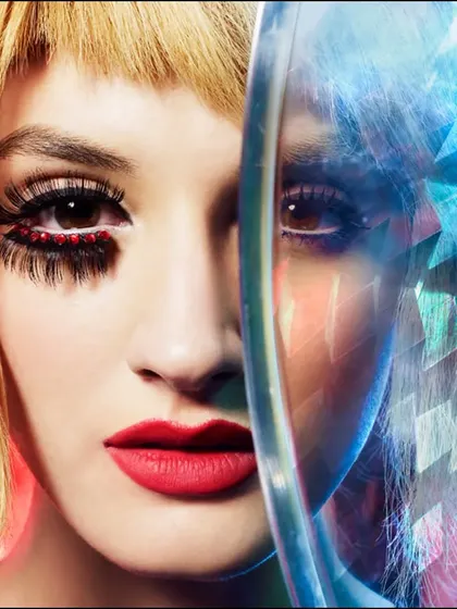 A futuristic and graphic beauty concept. The split-face effect, combining a clean look with a digitally refracted one, explores themes of identity and perception in a visually striking way.